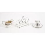 Silver and silver mounted wares, comprising; a seven bar toastrack, of faceted arch form,