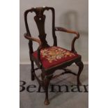 A George III style mahogany open armchair on cabriole pad feet, 57cm wide x 103cm high.