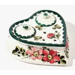 A Wemyss pottery heart shaped inkstand and two covers, circa 1900,