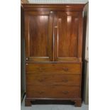 A late George III mahogany linen press with moulded panel doors over three long graduated drawers,