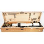A mid-20th century Carl Zeiss Jena telescope with tripod and accessories in a fitted wooden case,