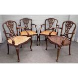 A set of four 18th century style mahogany open armchairs,