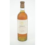 One bottle of 1962 Henekeys Chateau Guiraud Sauternes. Illustrated.