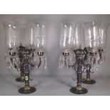 A group of four Victorian style table lights, with etched glass shades, 56cm high.