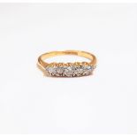 A gold and platinum, diamond set five stone ring, mounted with a row of variously cut diamonds,