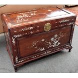 A 20th century mother-of-pearl inlaid Chinese rectangular hardwood lift top trunk,