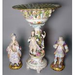 A pair of late 19th century Limoges porcelain figures of a man and a woman,