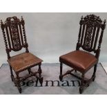 A matched set of six 18th century style oak highback dining chairs on turned block supports,