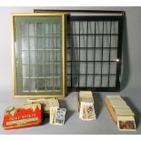 A quantity of early 20th century cigarette cards and frames (qty).