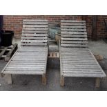 Goldcliff Teak; a pair of teak loungers, 200cm long x 35cm high, (2).