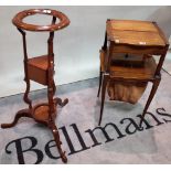 A late Victorian mahogany wash stand with two small drawers on three outswept supports,