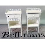 A pair of 20th century single drawer bedside tables, 40cm wide x 70cm high.