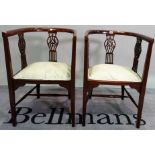 A pair of Edwardian mahogany framed tub chairs, 50cm wide x 78cm high, (2).