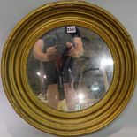 A 19th century giltwood framed circular wall mirror, 49cm diameter.