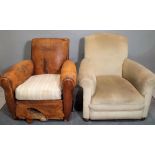 An early 20th century tan leather low armchair, 75cm wide x 76cm high,