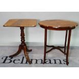 An Edwardian inlaid mahogany oval side table united by an X- frame stretcher, 67cm wide x 71cm high,