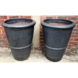 A pair of terracotta plant pots of tapering form, 56cm diameter x 70cm high, (2).