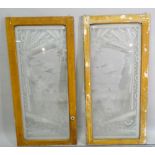 A pair of painted pine frames inset with etched glass panels depicting 19th century Dutch scenes,