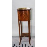 A late Edwardian mahogany and satinwood banded jardiniere on outswept supports,