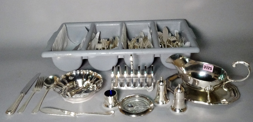 Silver plated wares including flatware, sauce boats, a toast rack and sundry (qty).