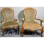 A late Victorian stained beech low open armchair, 60cm wide, and another similar low armchair,