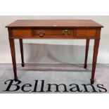 A George III style mahogany single drawer side table on tapering square supports,