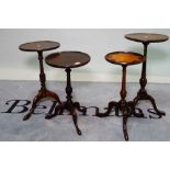 A group of four George III style mahogany wine tables of various sizes,