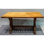 A pitch pine kitchen table with trestle and supports, 153cm long x 80cm high.