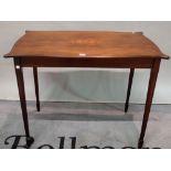 A Regency style inlaid mahogany side table with tapering square supports, 91cm wide x 71cm high.