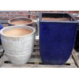 A pair of modern garden pots, 51cm wide x 52cm high and another similar,