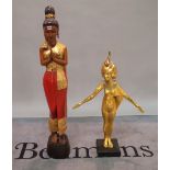 A large modern hardwood carved and painted figure of an Asian lady and a modern gilt figure of an