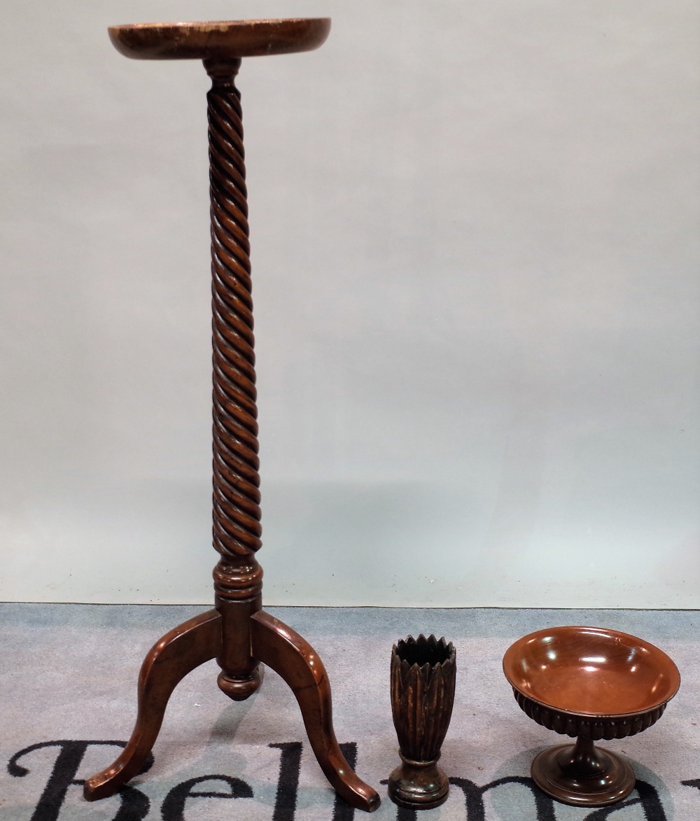 A late 19th century mahogany jardiniere stand with a spiral twisted column, 28cm wide x 107cm high,