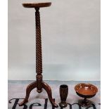 A late 19th century mahogany jardiniere stand with a spiral twisted column, 28cm wide x 107cm high,