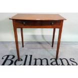 A 19th century mahogany bowfront single drawer side table on tapering square supports,