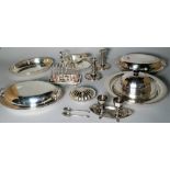 Silver plated wares including a pair of candlesticks, jugs, entrée dishes and sundry, (qty).
