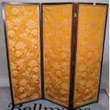 An early 20th century stained beech three fold upholstered screen, 50cm wide x 153cm high,