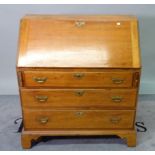 A walnut bureau with three long graduated drawers on bracket feet, 91cm wide x 101 cm high.