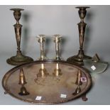 A pair of modern silver table candlesticks, marked 925, 15cm high, a pair of plated candlesticks,