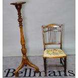 A Victorian style stained beech jardiniere stand on turned column, 25cm diameter x 112cm high,