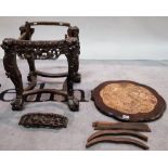 An early 20th century Chinese hardwood stand, inset with a marble top, 41cm wide x 45cm high.