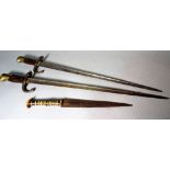 Two early 20th century French bayonets and an African knife, (3).