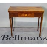 An early 19th century inlaid mahogany French foldover tea table on tapering square supports,