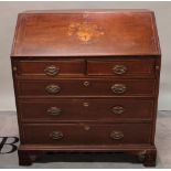 An Edwardian inlaid mahogany bureau,