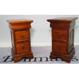A pair of modern hardwood bedside chests of two drawers, 38cm wide x 65cm high, (2).