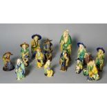 A group of thirteen Asian ceramic figures, the tallest 16cm (13).