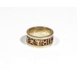 A yellow precious metal band ring, applied with zodiac symbols,