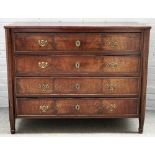 A 19th century Continental rosewood chest, with four long drawers flanked by hexagonal columns,