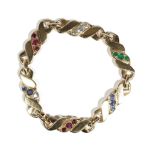 A gold, emerald, sapphire, ruby and diamond-set bracelet, by M Gerard,