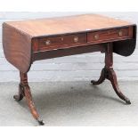 A George III mahogany sofa table, with opposing opposite frieze drawers, on four downswept supports,