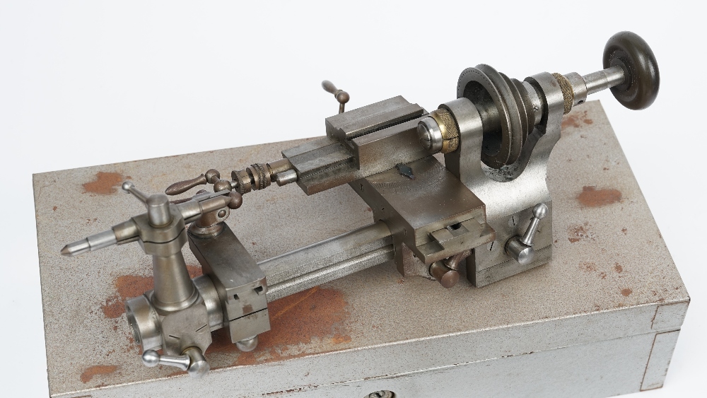 A Horologists steel lathe, a die set and related horological accessories. - Image 3 of 5